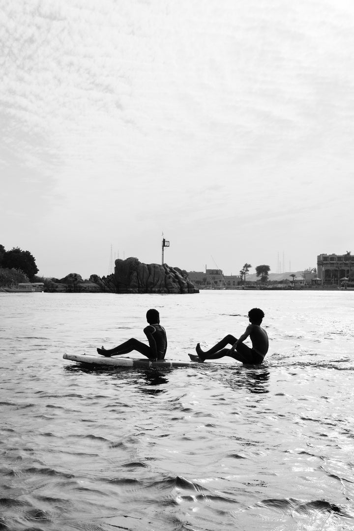 Floating on the Nile in Aswan framed in black wood, 30×40 cm frame