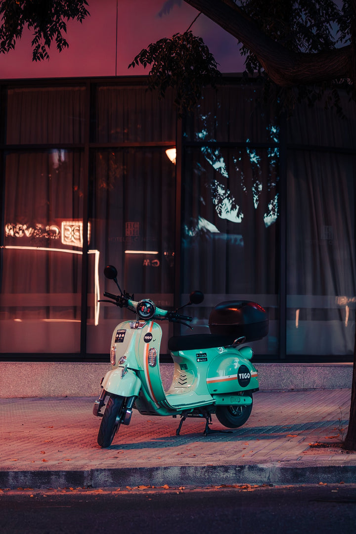 The turquoise Vespa in Seville framed in black wood, 30×40 cm frame